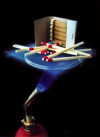 Matches on NASA aerogel, with a flame underneath. A demonstration of aerogel's insulation properties.
